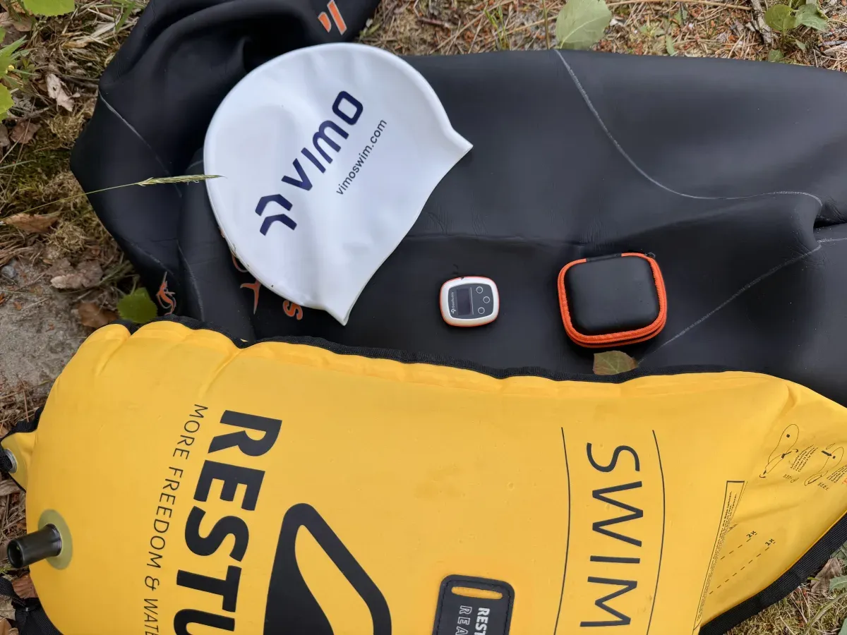 Vimo Swim kit on a wetsuit by the lake